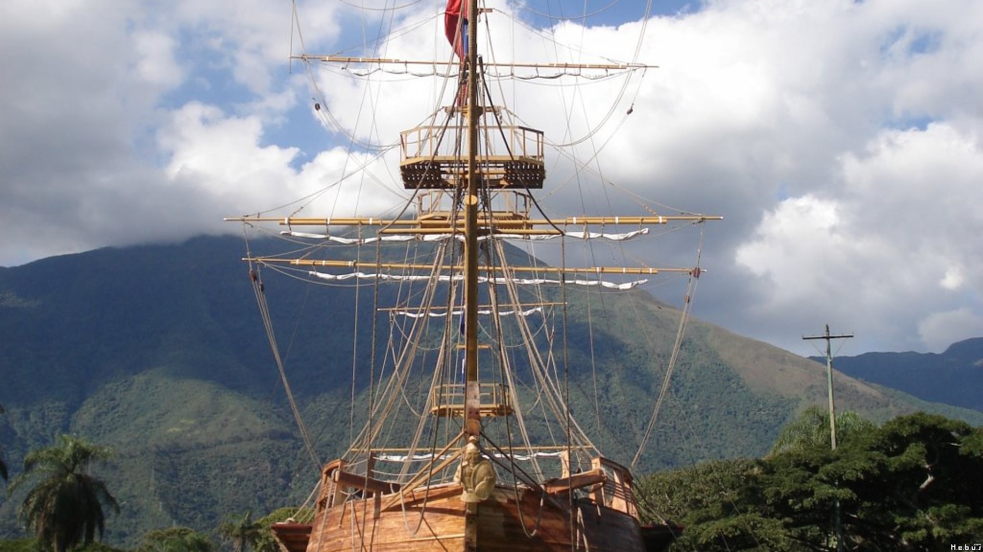 ship mast against mountains