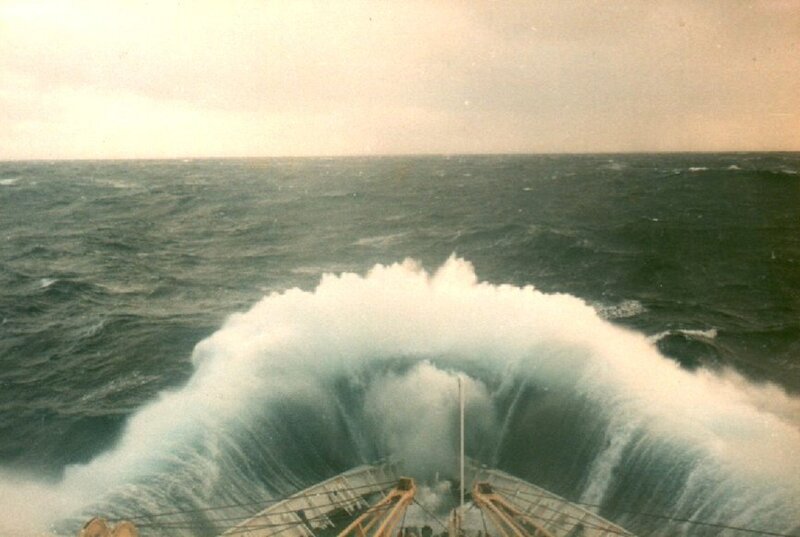 Ship navigating a stormy sea