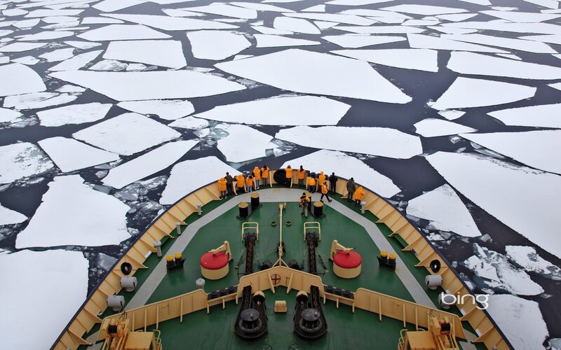 ship navigating ice floes