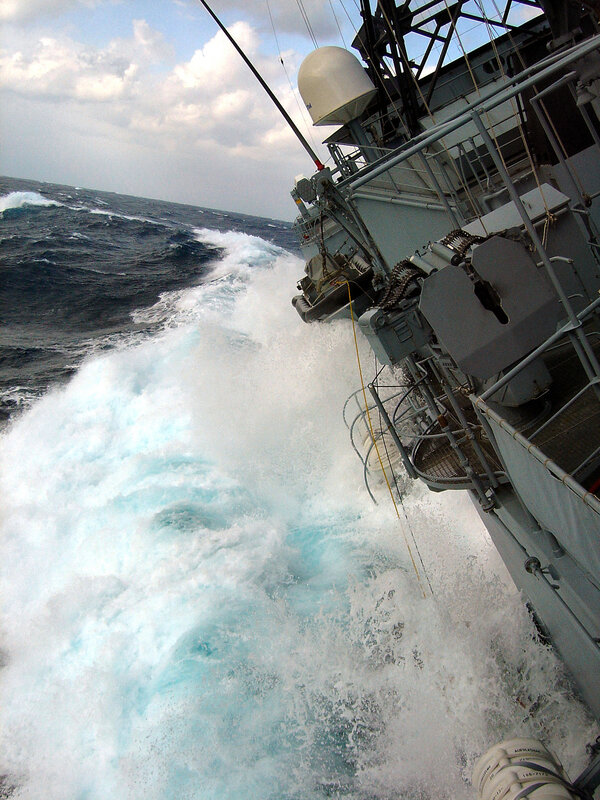 Ship Navigating Rough Seas — Blue