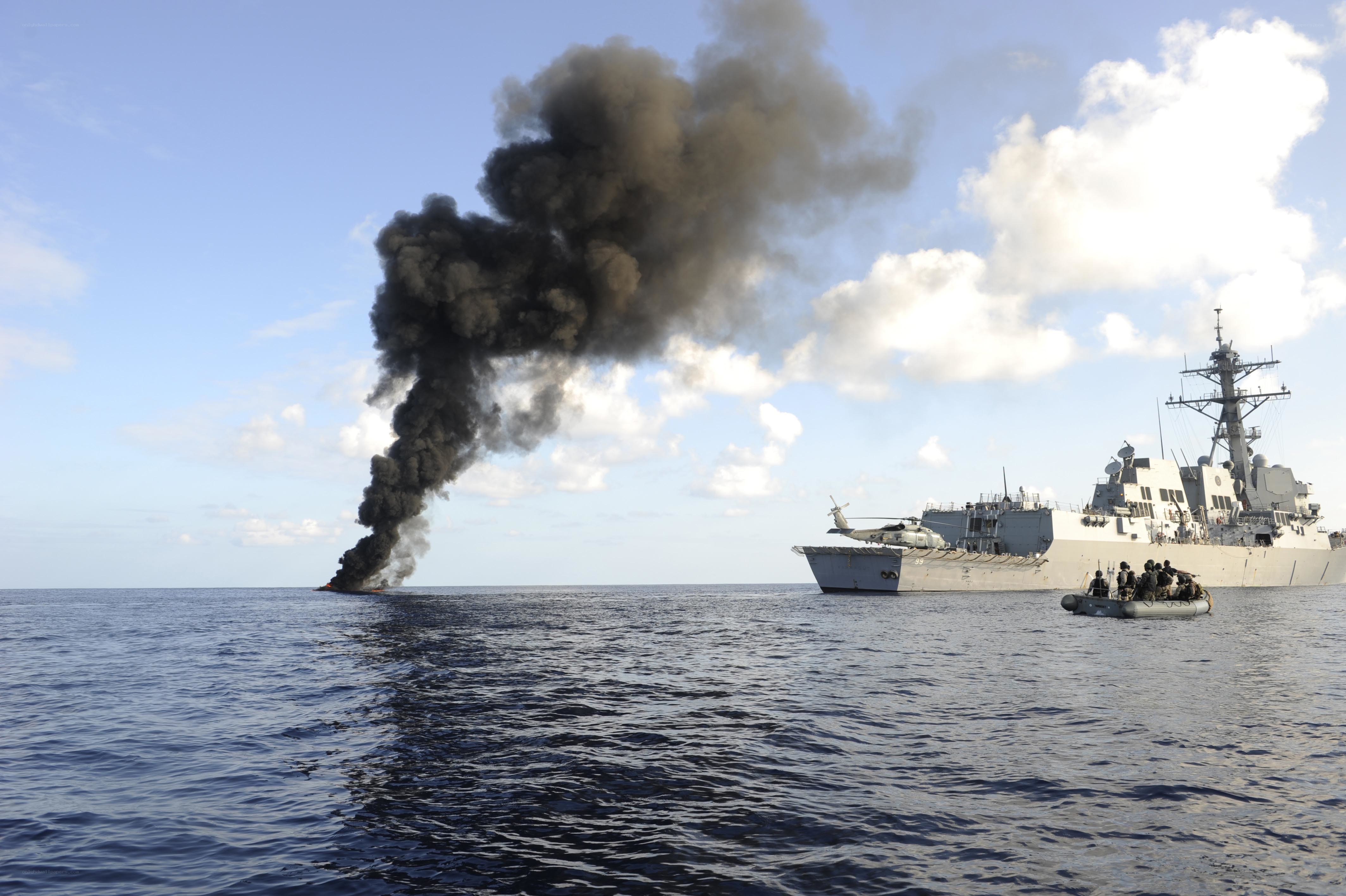 Ship near burning oil rig