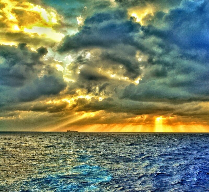 Ship on Ocean at Sunset — Blue, Dramatic
