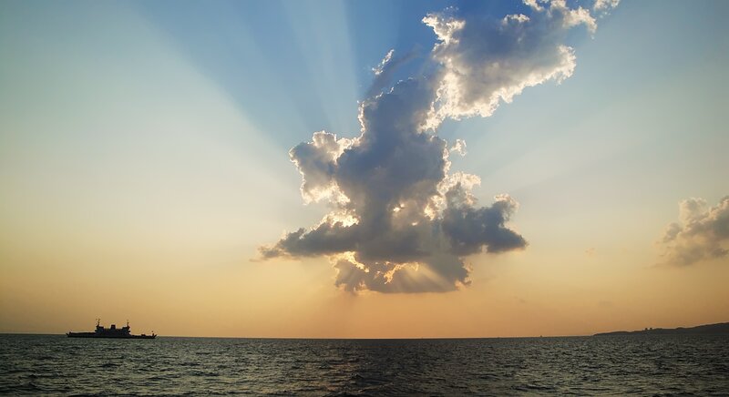 Ship on Ocean at Sunset — Blue