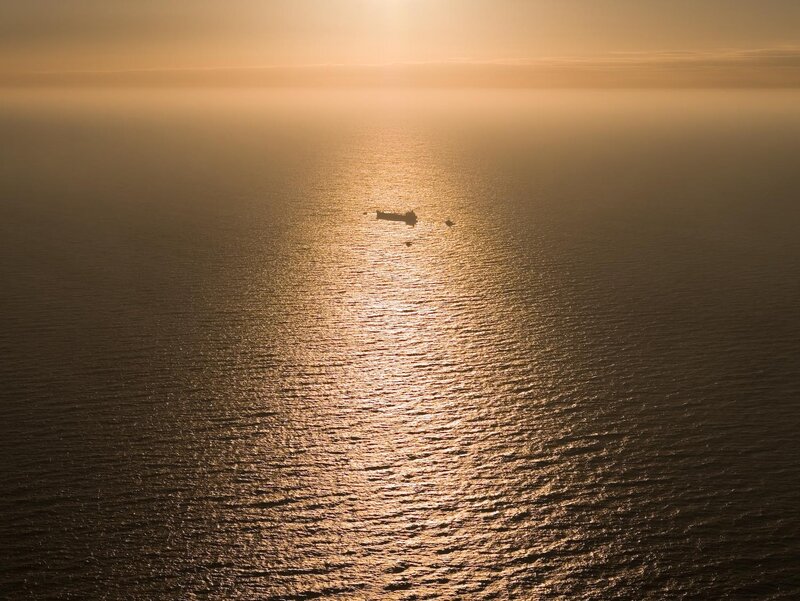 Ship on Ocean at Sunset — Gold