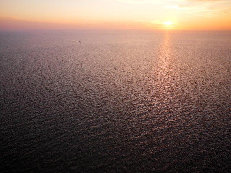 Ship on Ocean at Sunset — Orange, Serene
