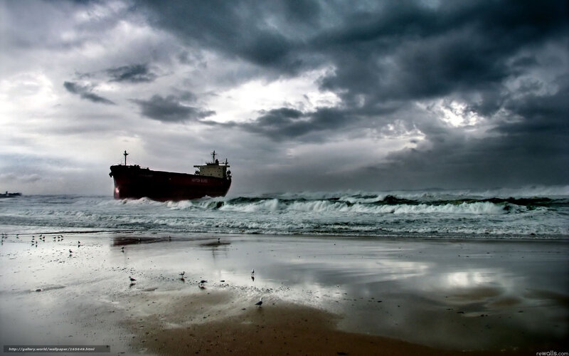 Ship on stormy beach