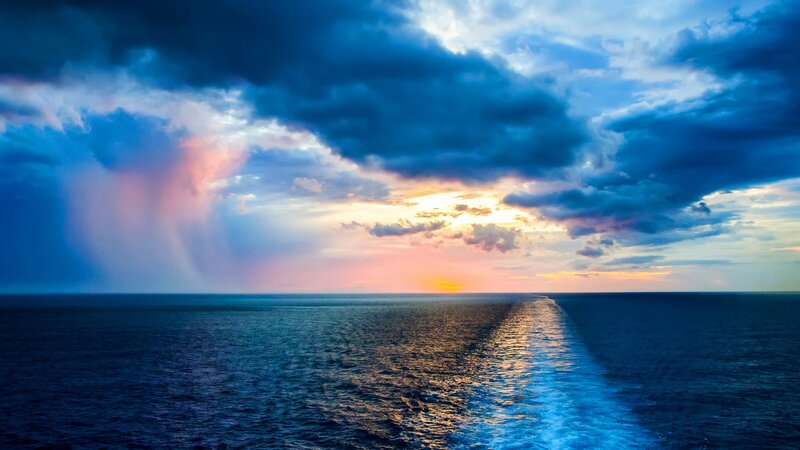 Ship Wake on Ocean — Blue, Dramatic, Sunset