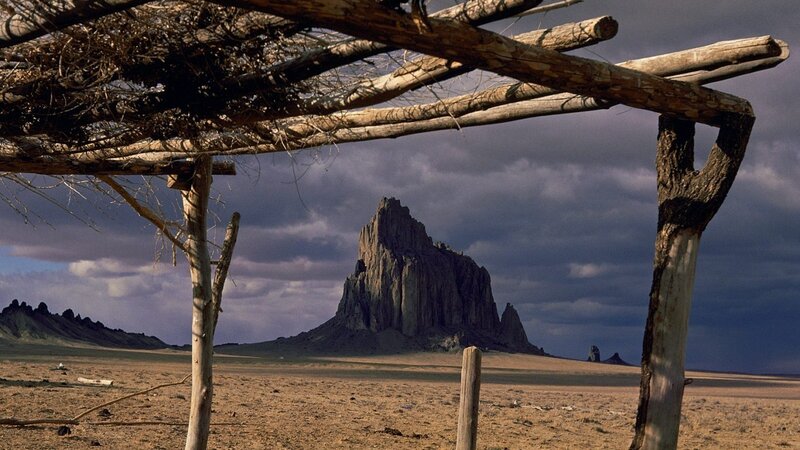 Shiprock Rock Formation — Brown, Dramatic, Afternoon, Photograph, Wooden Structure