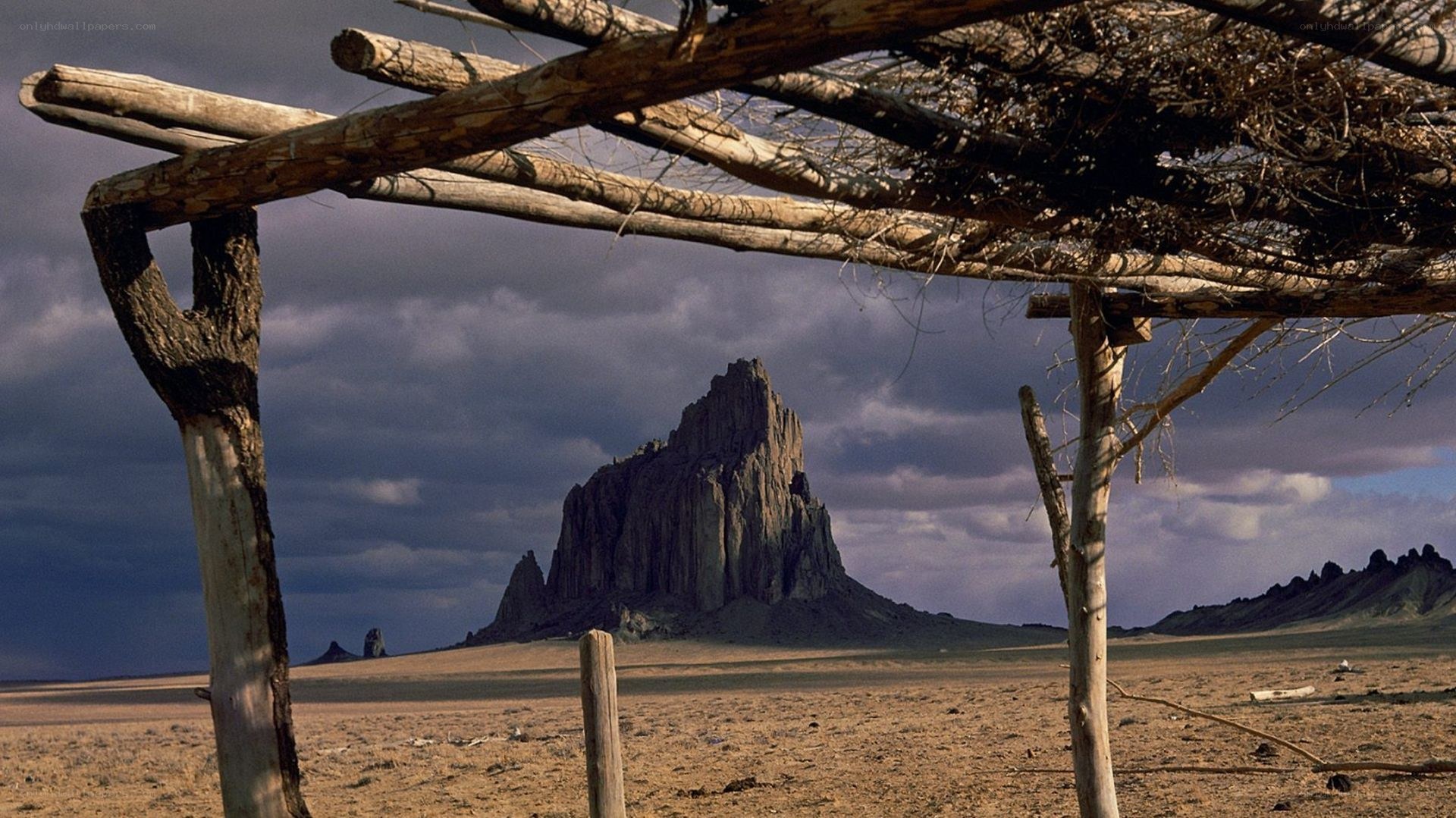 Shiprock rock formation in desert