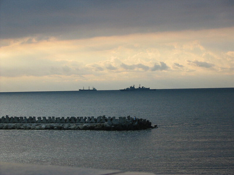 ships at sea during sunset