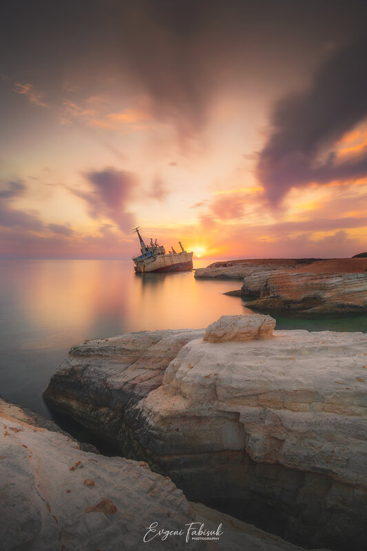 Shipwreck at Sunset — Orange, Dramatic, Photograph, Rocks