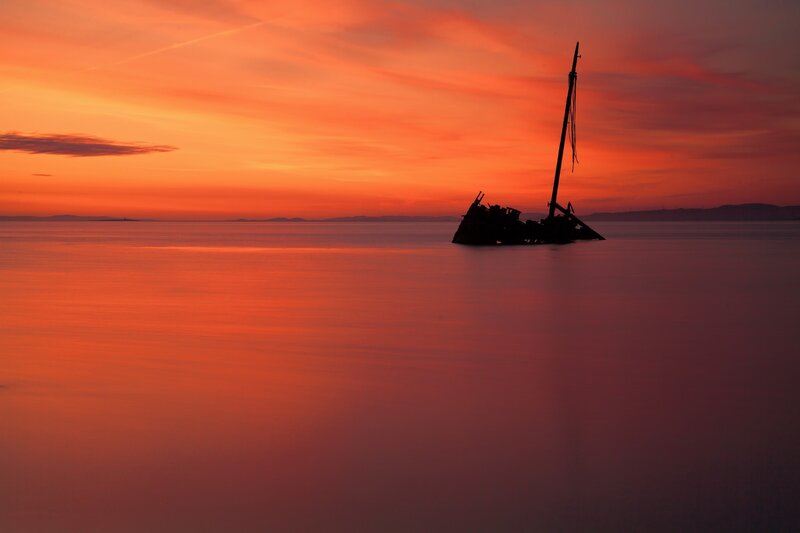 Shipwreck at Sunset — Orange, Dramatic, Photograph