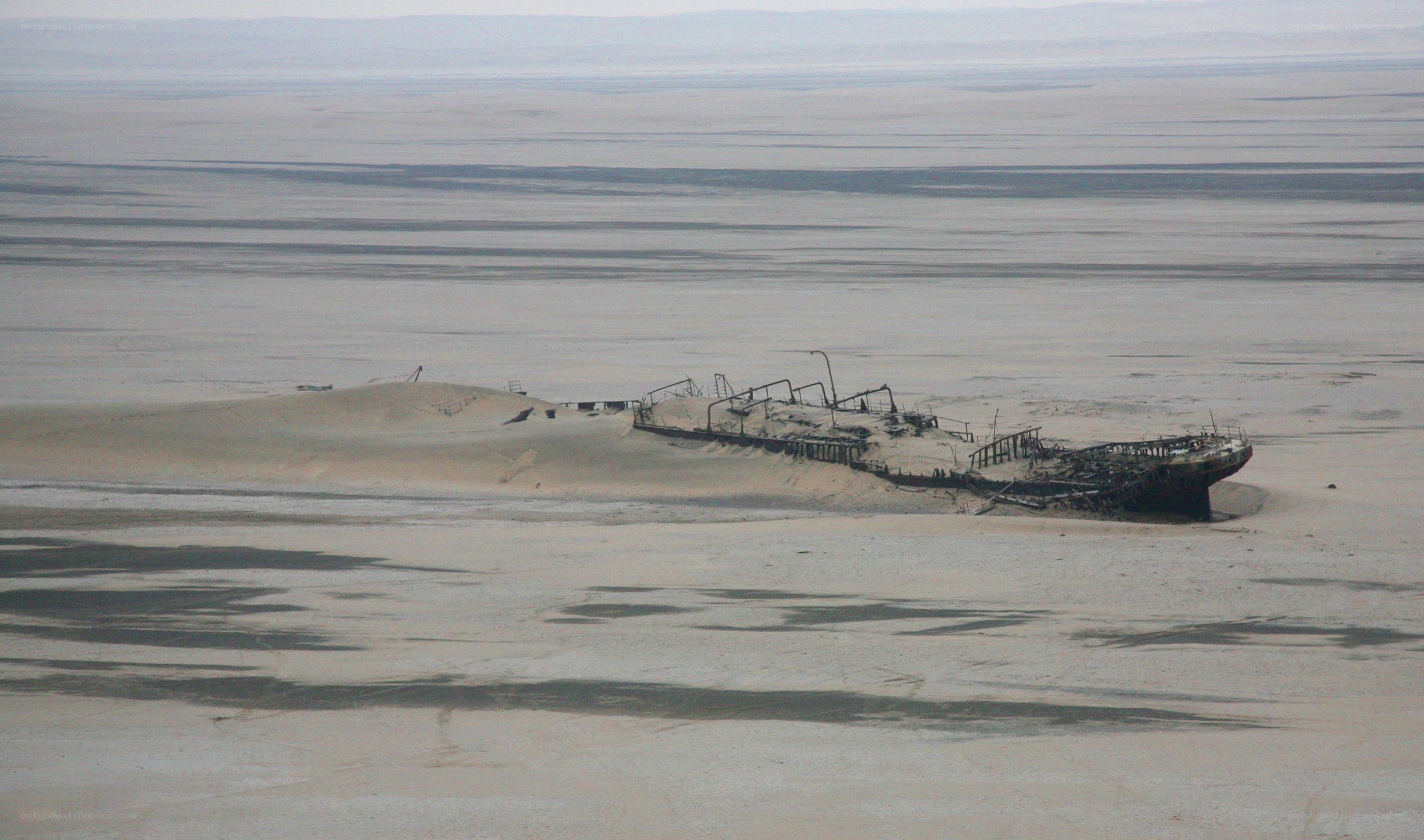 shipwreck in desert sands