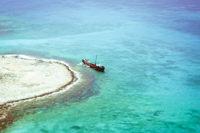 Shipwreck in Turquoise Water — Blue