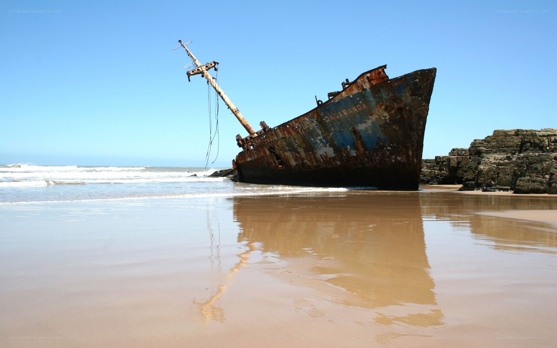 shipwreck on a sandy beach