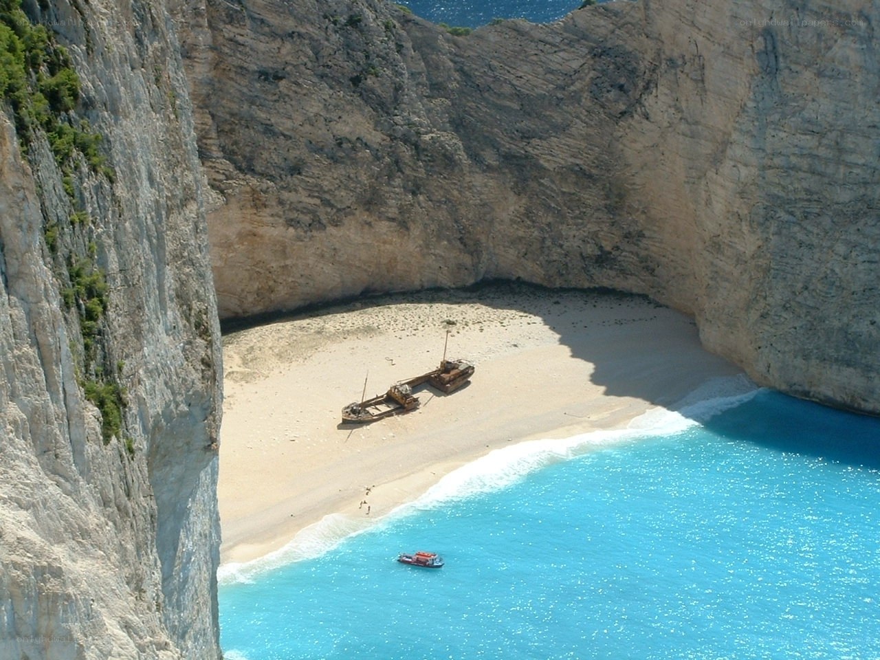 Shipwreck on a secluded beach