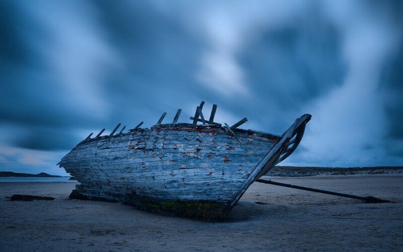 shipwreck on a stormy beach
