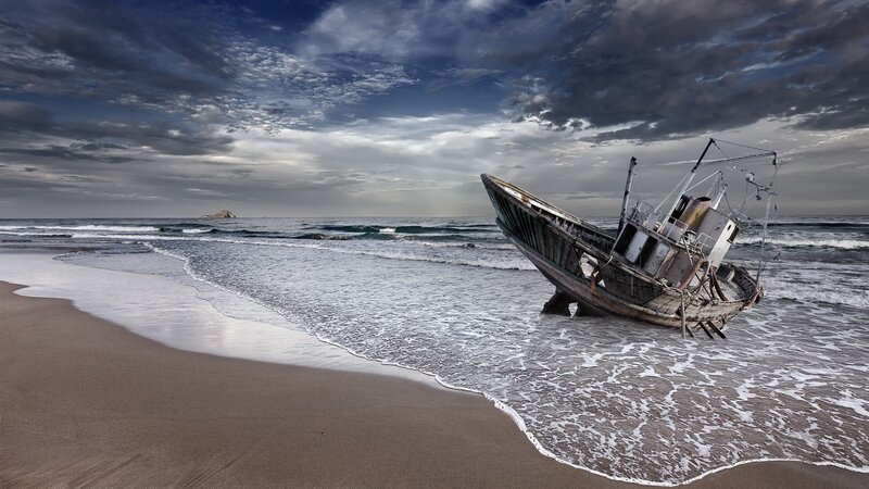 shipwreck on a stormy beach