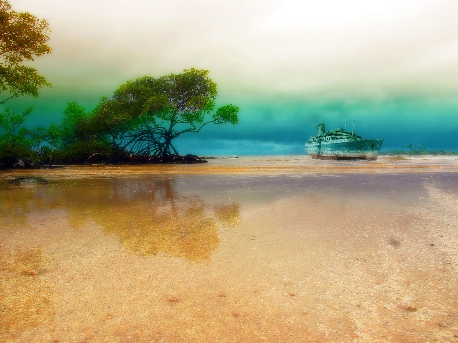 shipwreck on a tropical beach