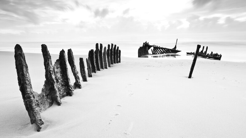 Shipwreck on Beach — Black, Desolate
