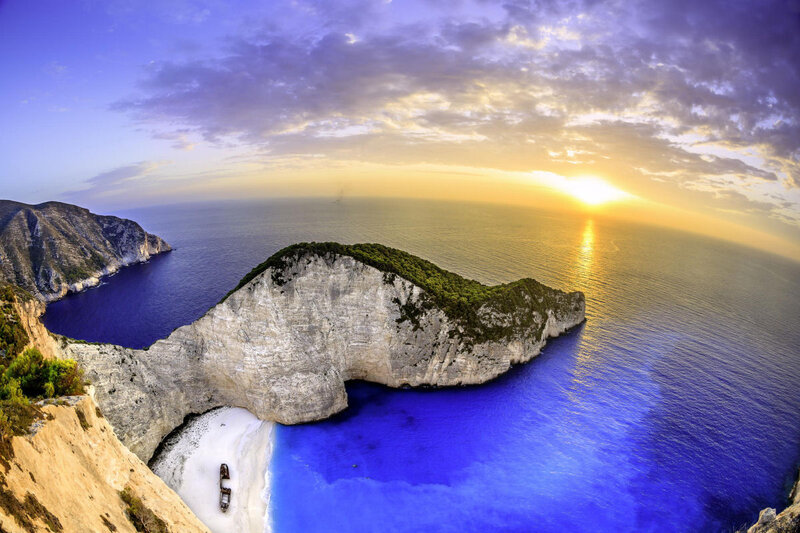 Shipwreck on Beach — Blue, Dramatic, Sunset, Photograph, Cliffs, Boat