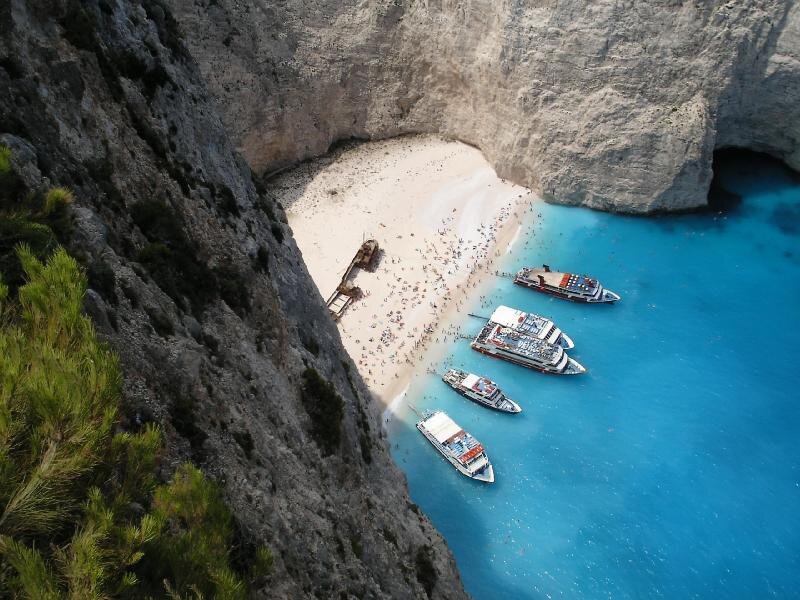 Shipwreck on Beach — Blue, Serene, Afternoon, Photograph, Boats