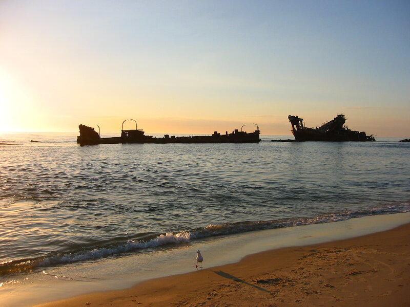 Shipwreck on Beach — Blue, Serene, Sunrise