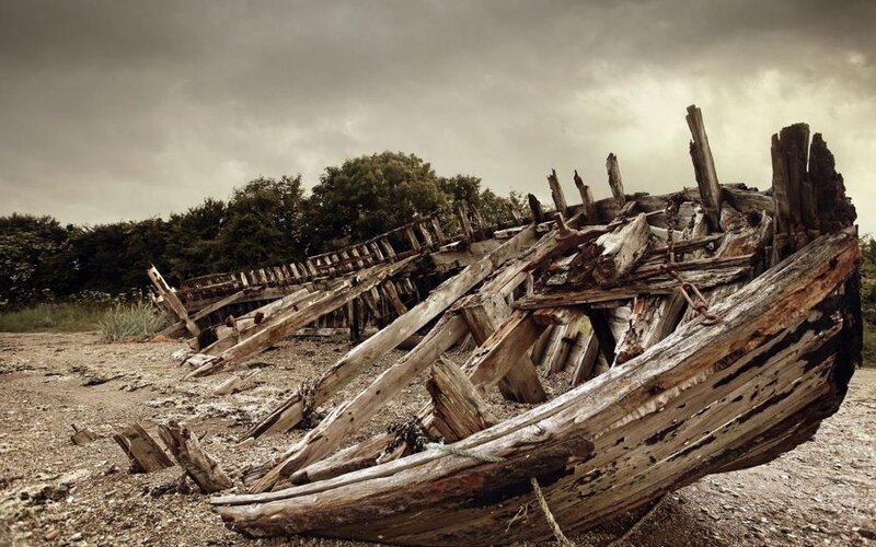 Shipwreck on Beach — Brown, Dramatic, Photograph