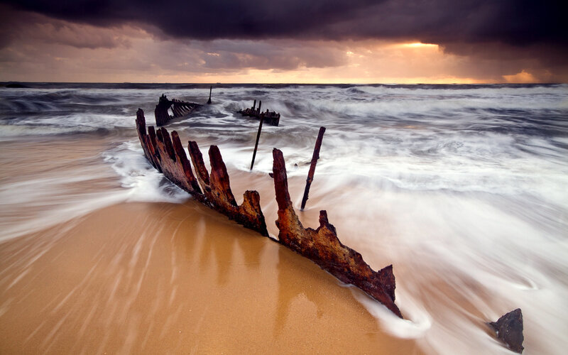 Shipwreck on Beach — Brown, Dramatic