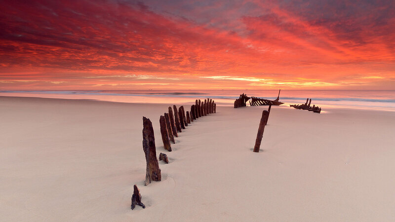 Shipwreck on Beach — Red, Dramatic