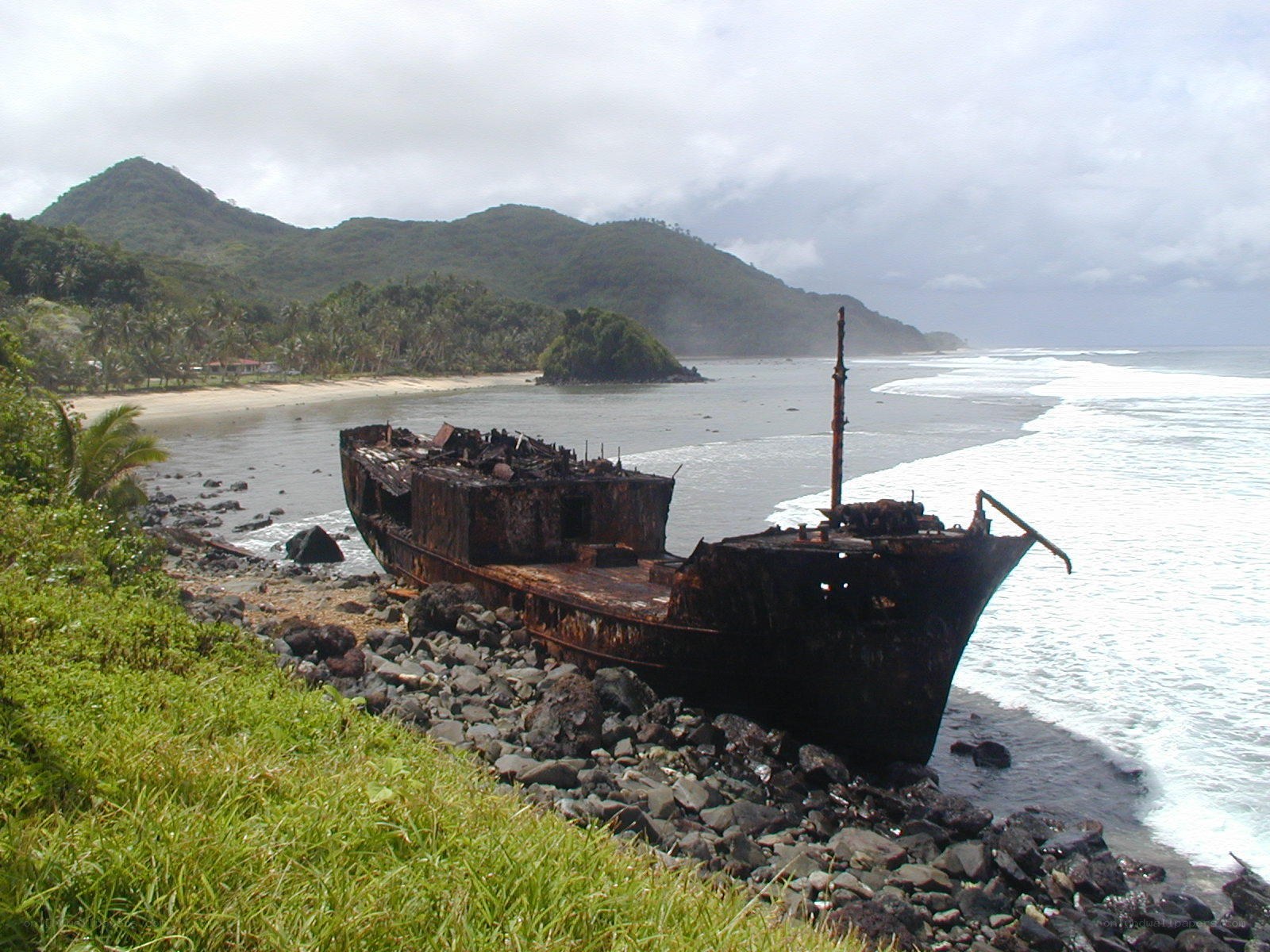 shipwreck on rocky beach