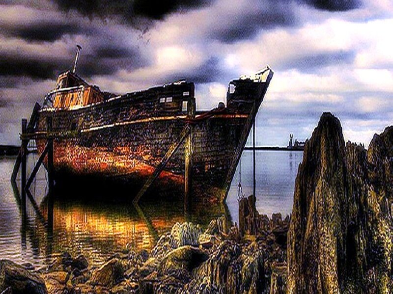 shipwreck on rocky shore