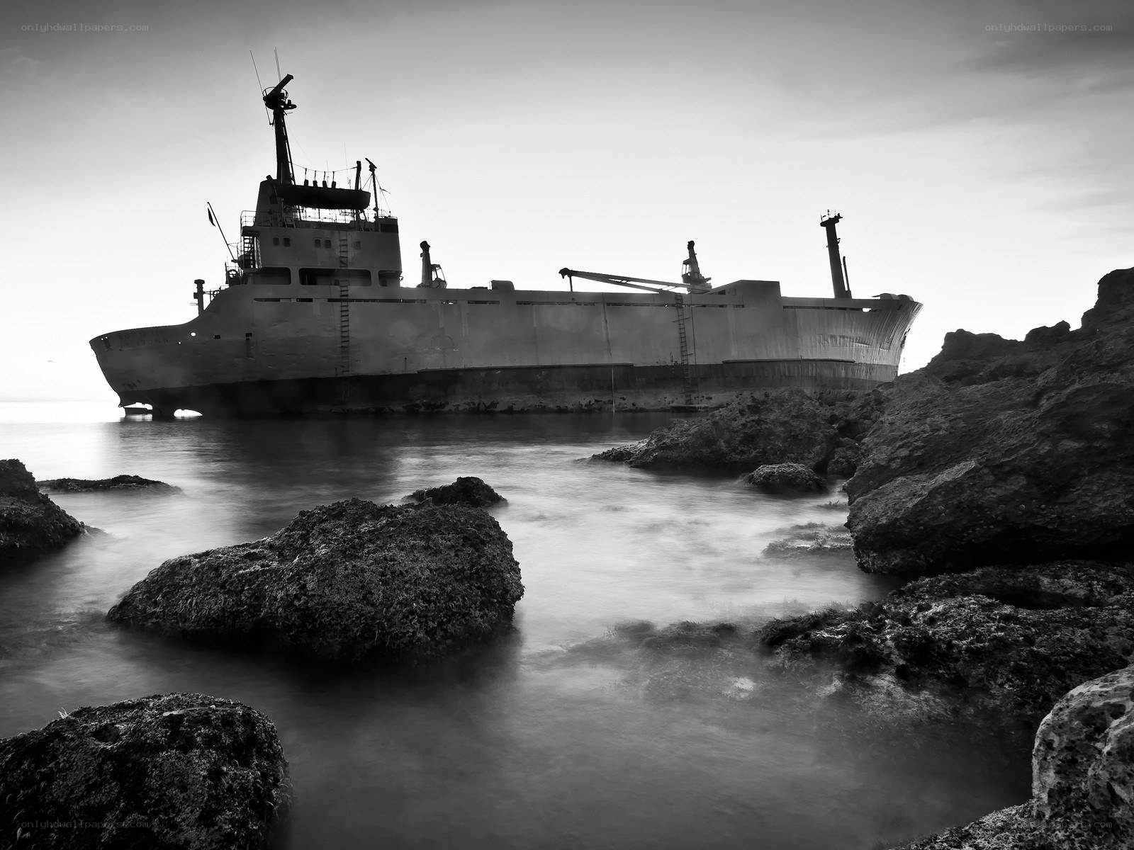 shipwreck on rocky shore