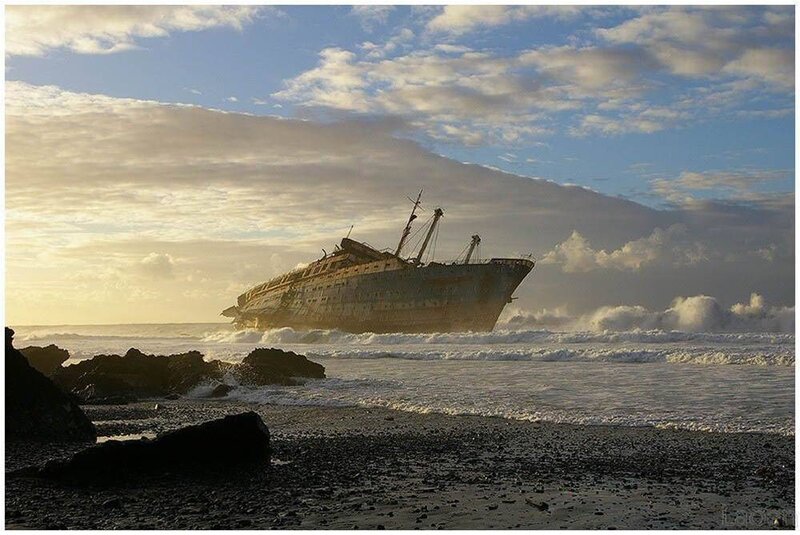 Shipwreck on Rocky Shore — Blue