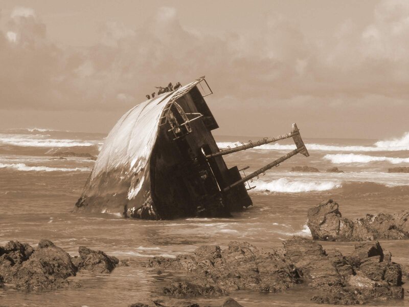 Shipwreck on Rocky Shore — Brown