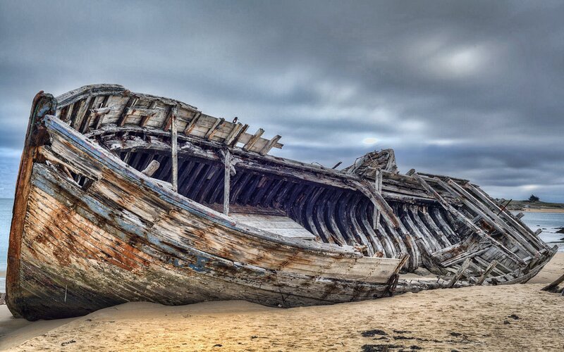 shipwreck on sandy beach