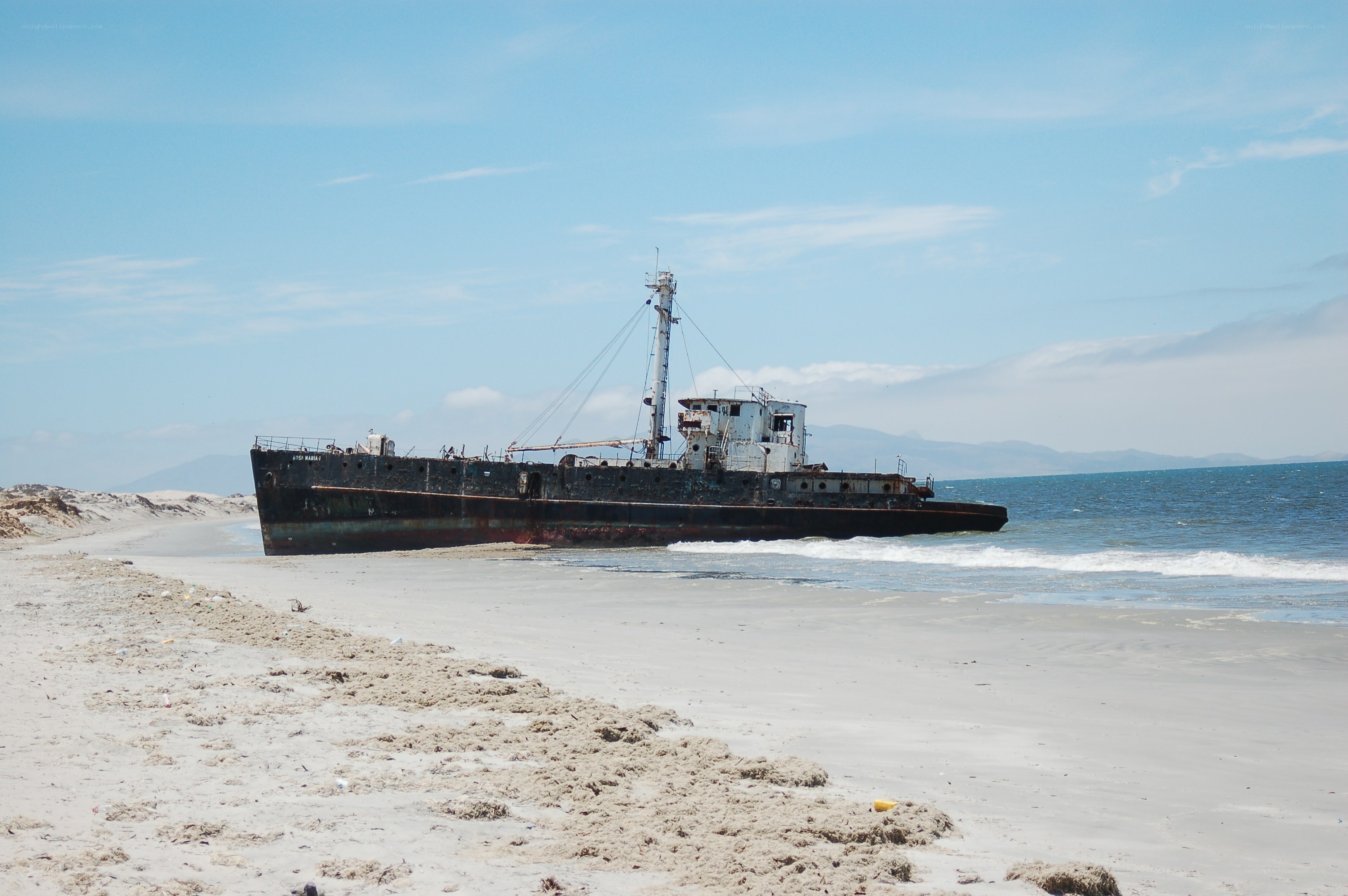 shipwreck on sandy beach