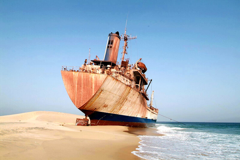 shipwreck on sandy beach