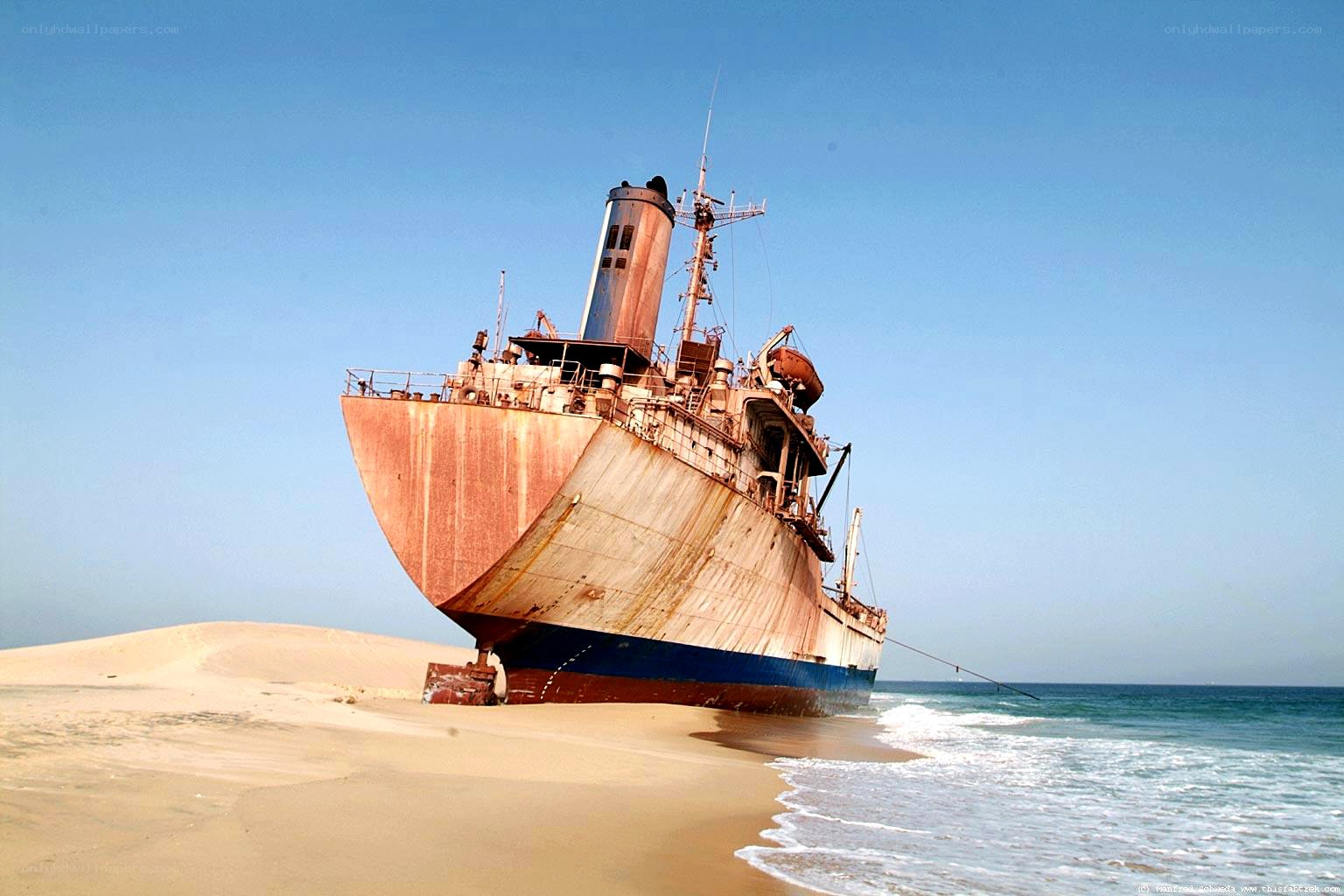 shipwreck on sandy beach