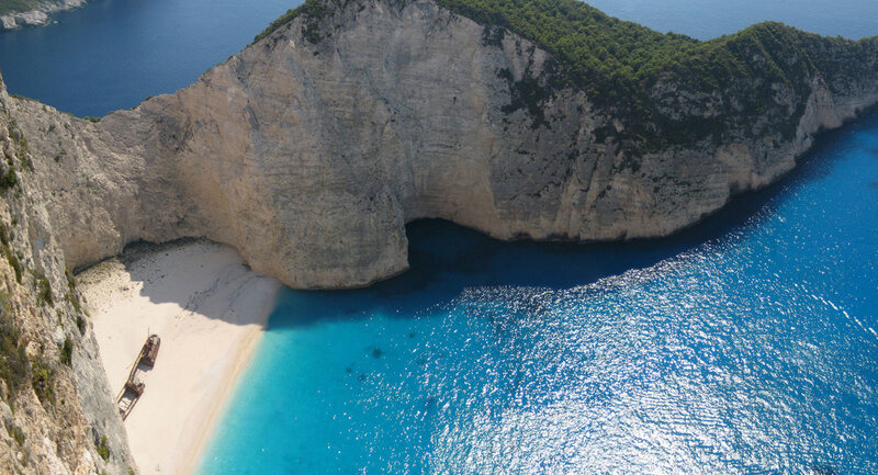 Shipwreck on Sandy Beach — Blue, Serene