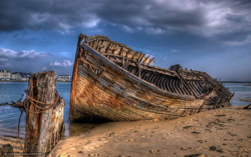 shipwreck on sandy shore