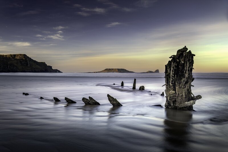 Shipwreck Remains on Beach — Blue