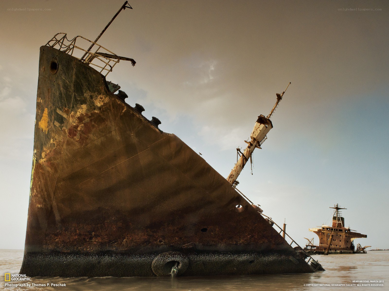 Shipwrecked vessels on a beach