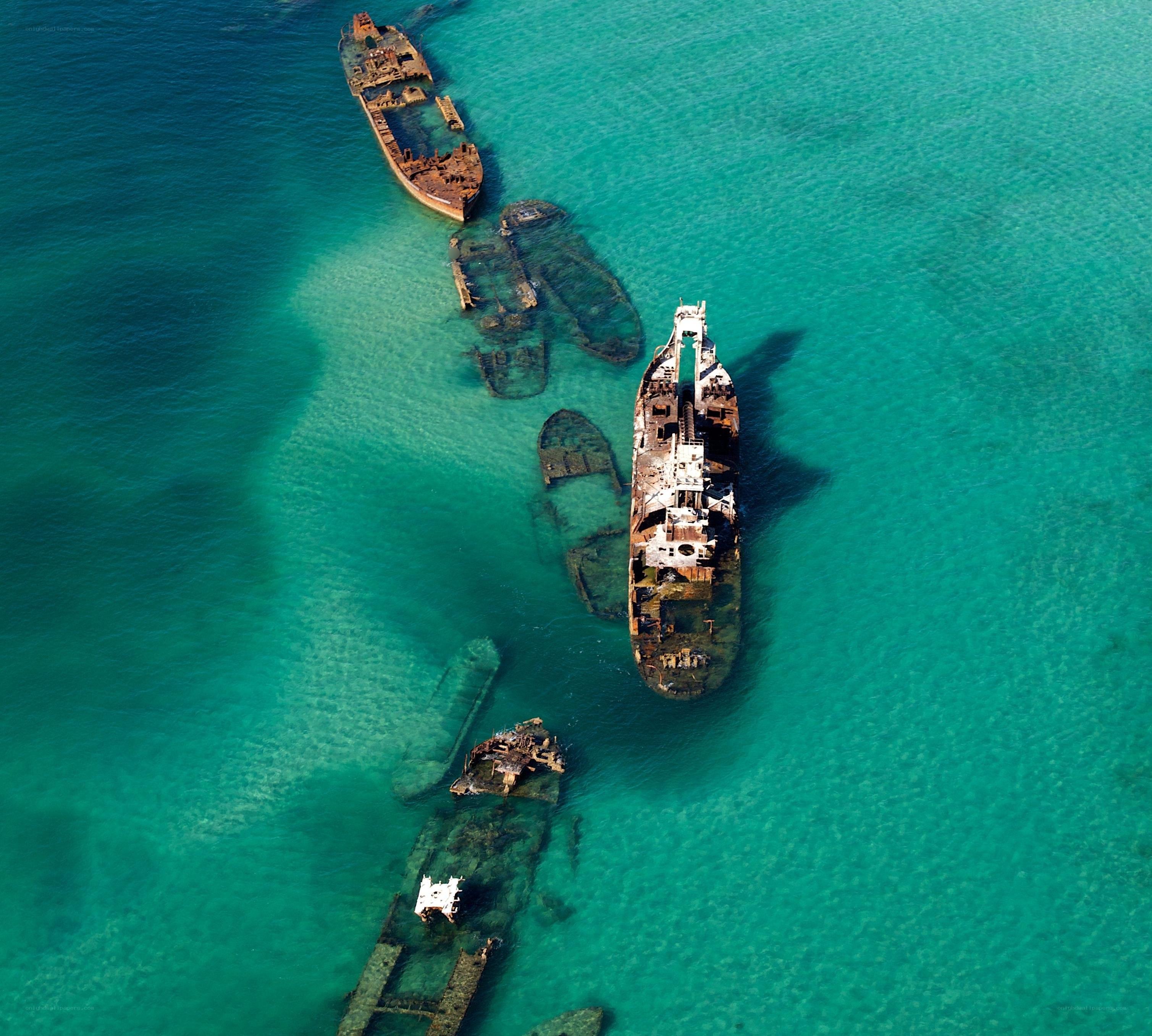 shipwrecks in turquoise water