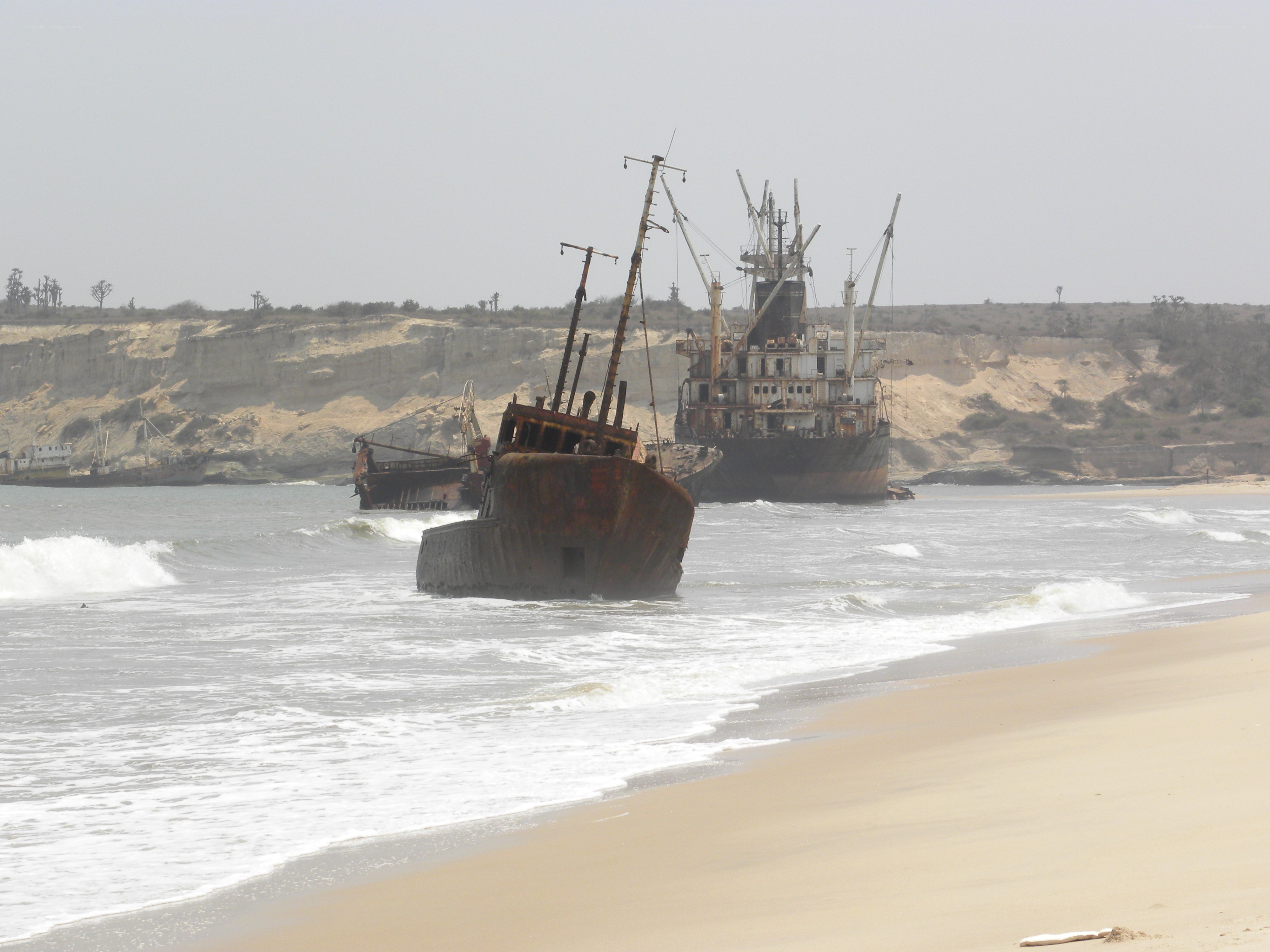 shipwrecks on a sandy beach
