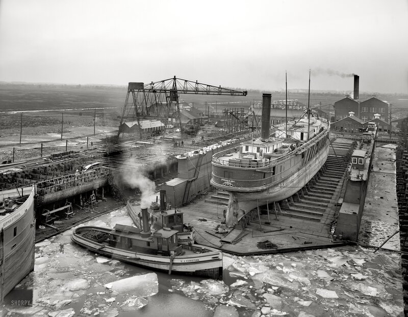 Shipyard with ice-covered water