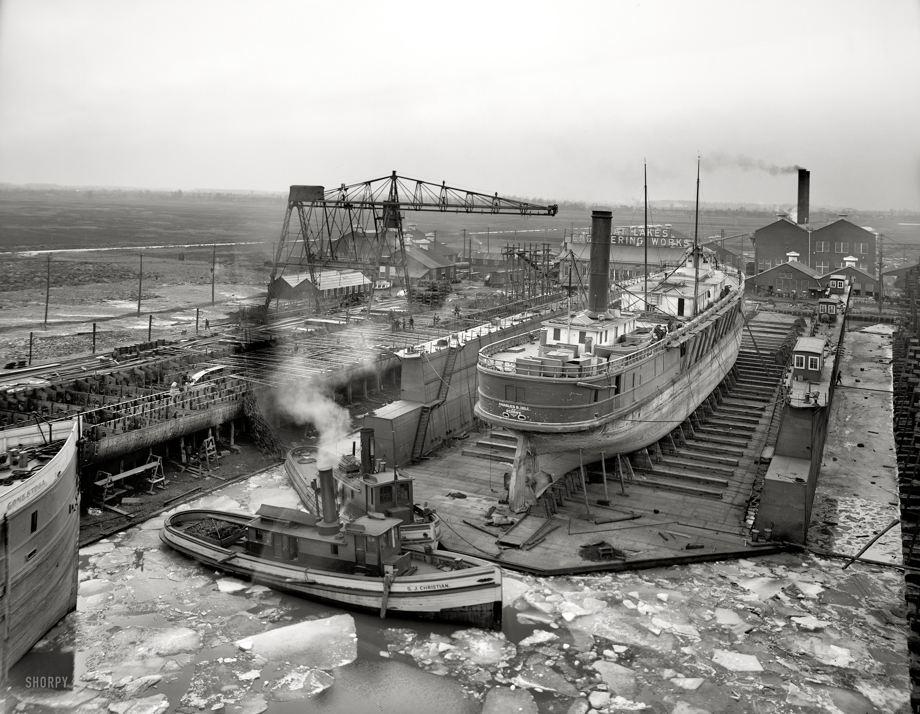 Shipyard with ice-covered water