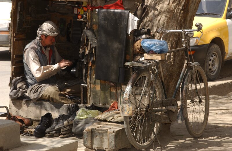 Shoemaker at Stall