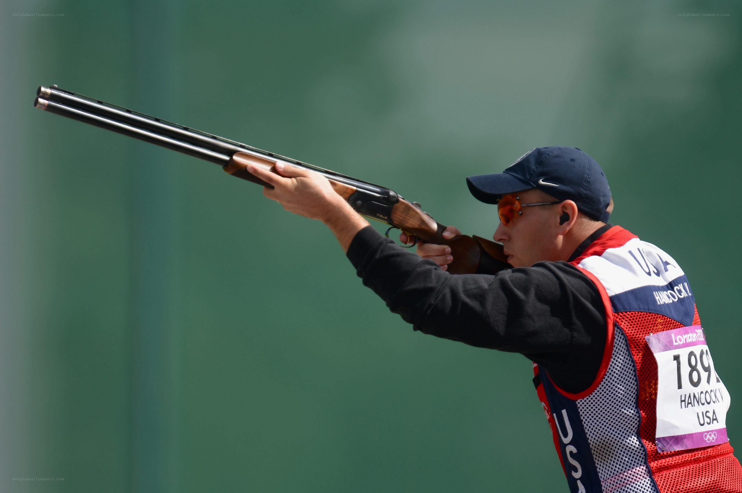 shooter aiming shotgun