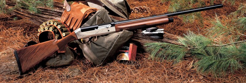 shotgun with ammunition and gear